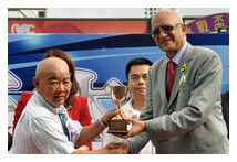 Trainer Vincent Chong gets his trophy